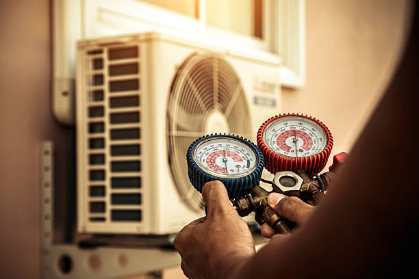 Professional Heat Pump Repair technician working in Township Of Washington, NJ